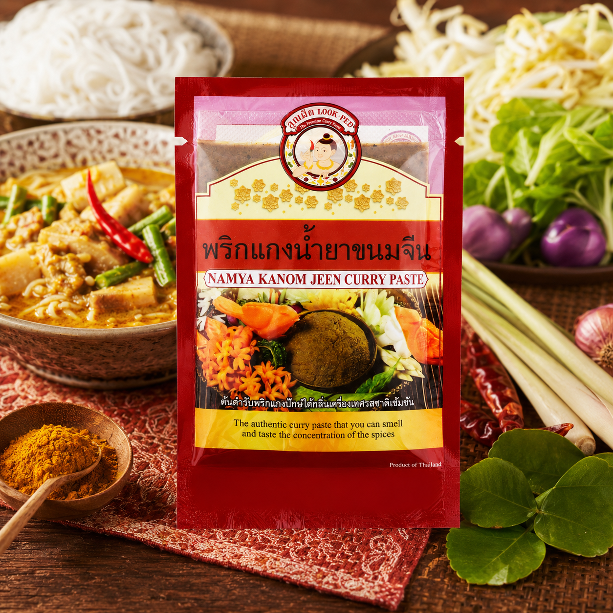 Namya Kanom Jeen Curry Paste package with ingredients in the background