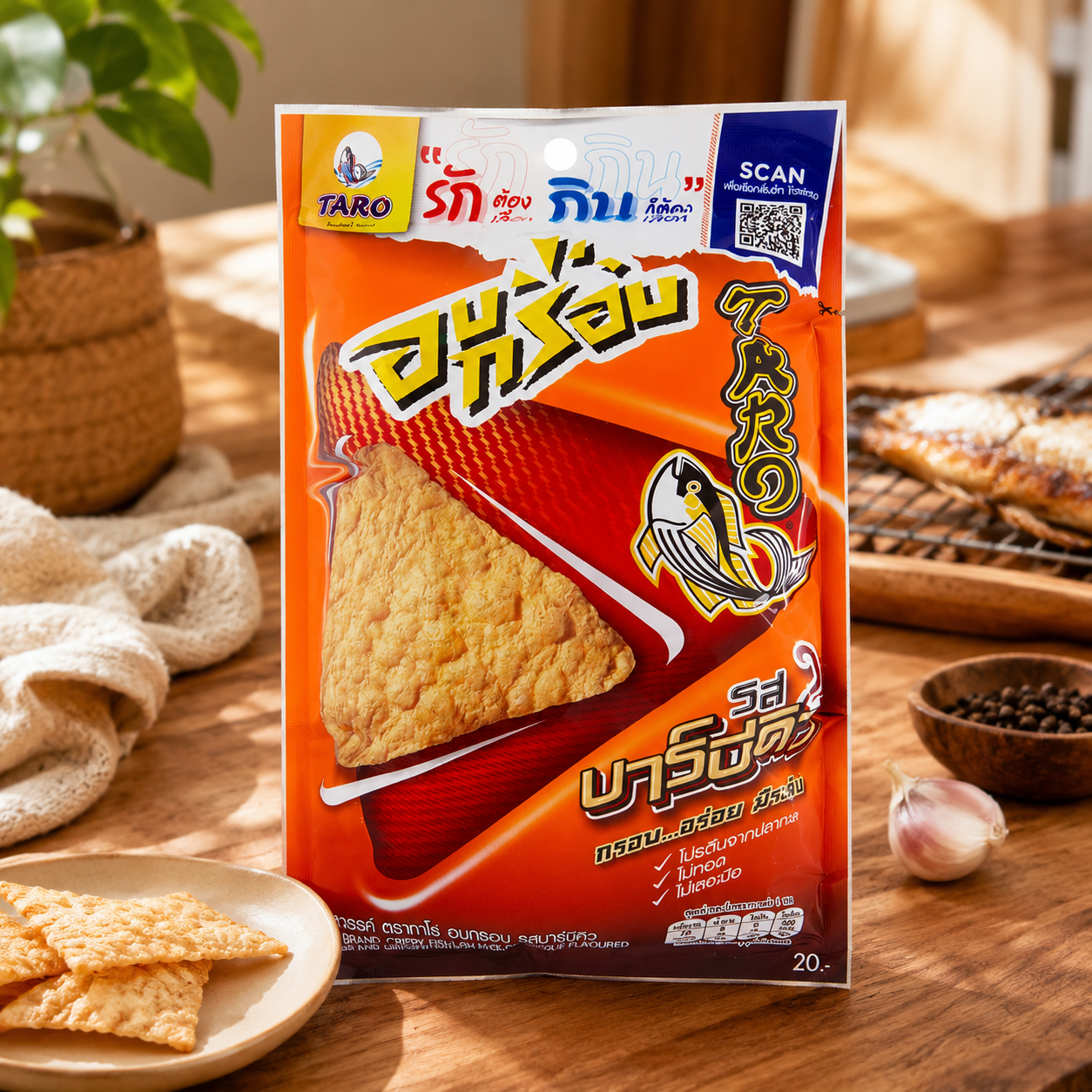 Taro brand snack package on a wooden table with snacks and a plant in the background